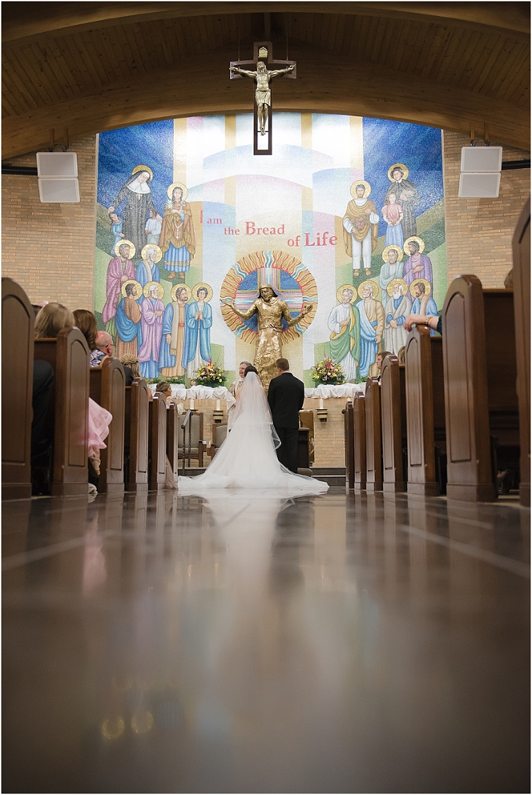 Wedding at St Jude Catholic Church in Beaumont Kristi and Mason